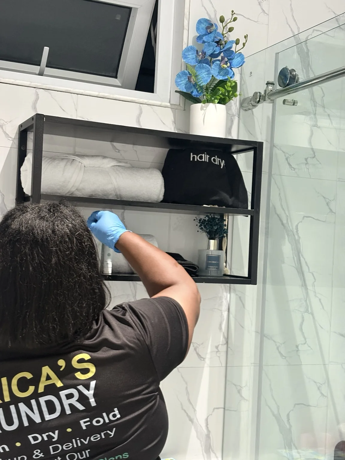ELCS team member attending to bathroom details